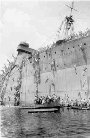 A bow shot showing men still abandoning ship